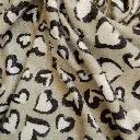 maille-imprimee-coeurs-leopard-beige-tissu-dormant-1.webp