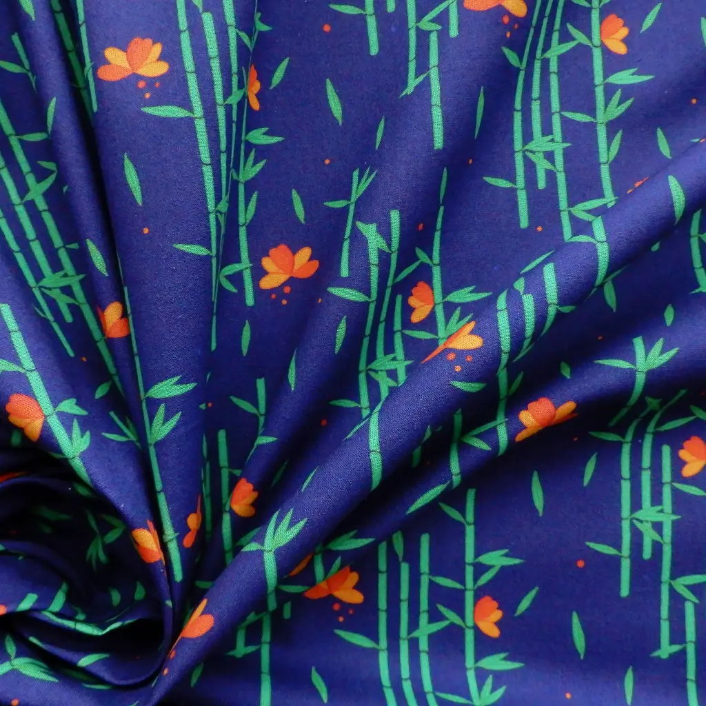 Popeline de coton Bambou sur fond bleu