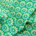 Crêpe de polyester à fleurs géométriques sur fond vert