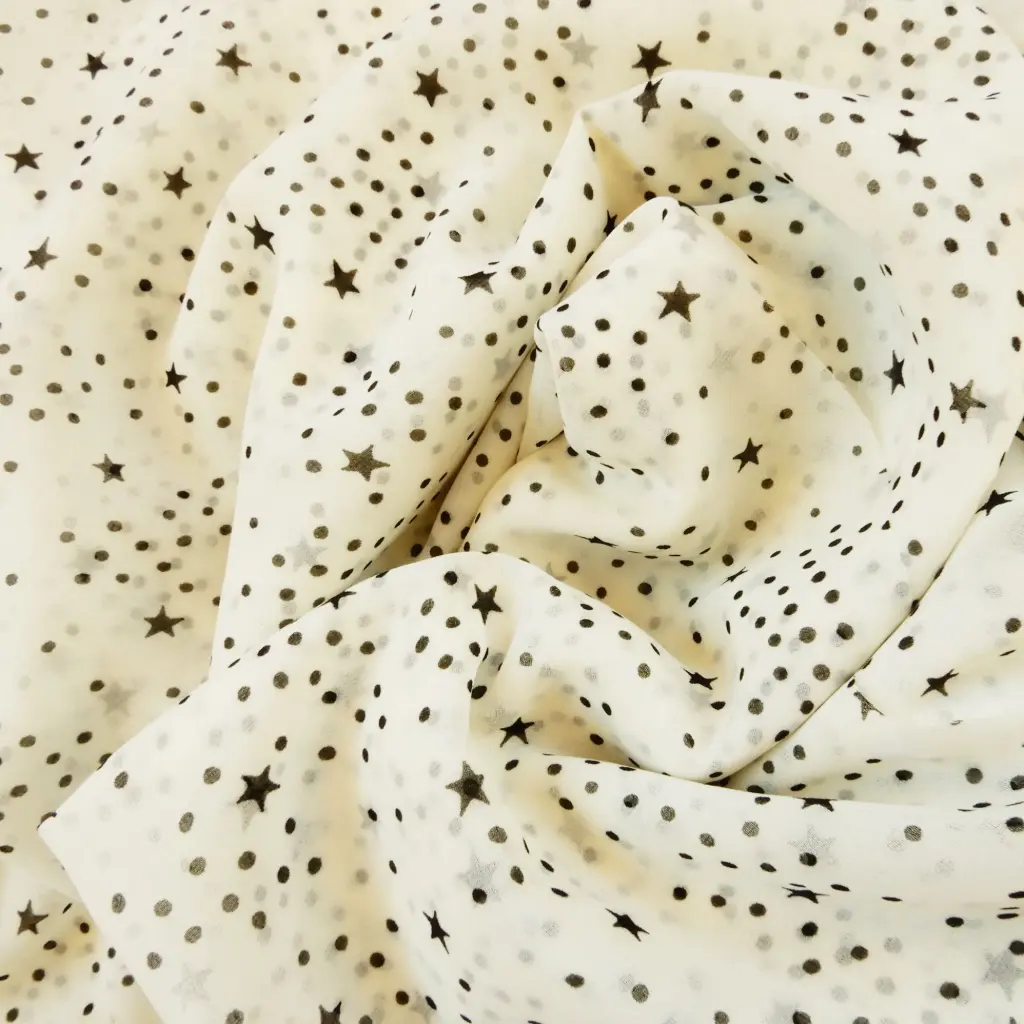 Mousseline écrue imprimée d'étoiles