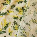 Voile de coton écru brodé imprimé de mimosas