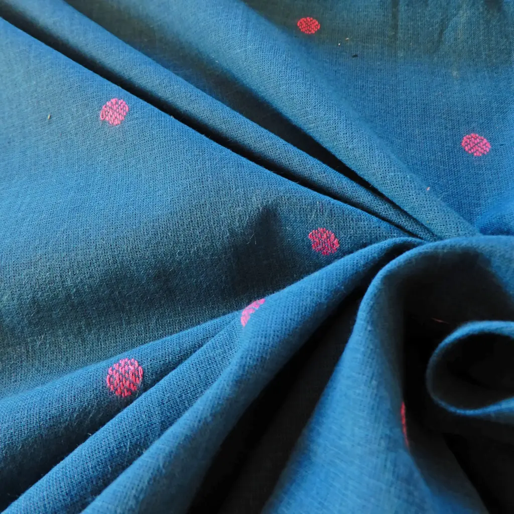 Tissu Petits ronds roses sur fond bleu