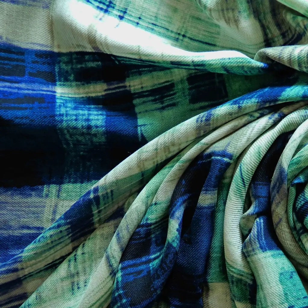 Fin tissu de laine dans les tons verts bleus