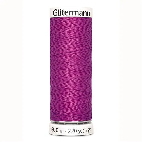 Fil à coudre mauve