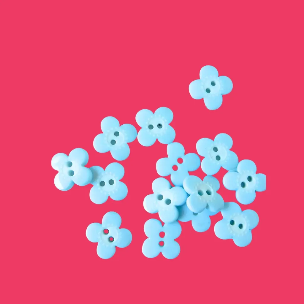 Petits boutons fleurs bleues