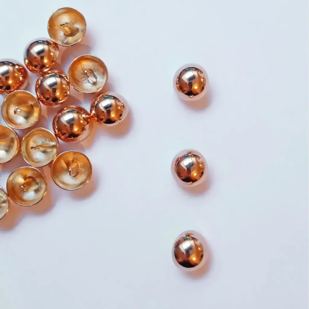 Boutons à pied en métal doré