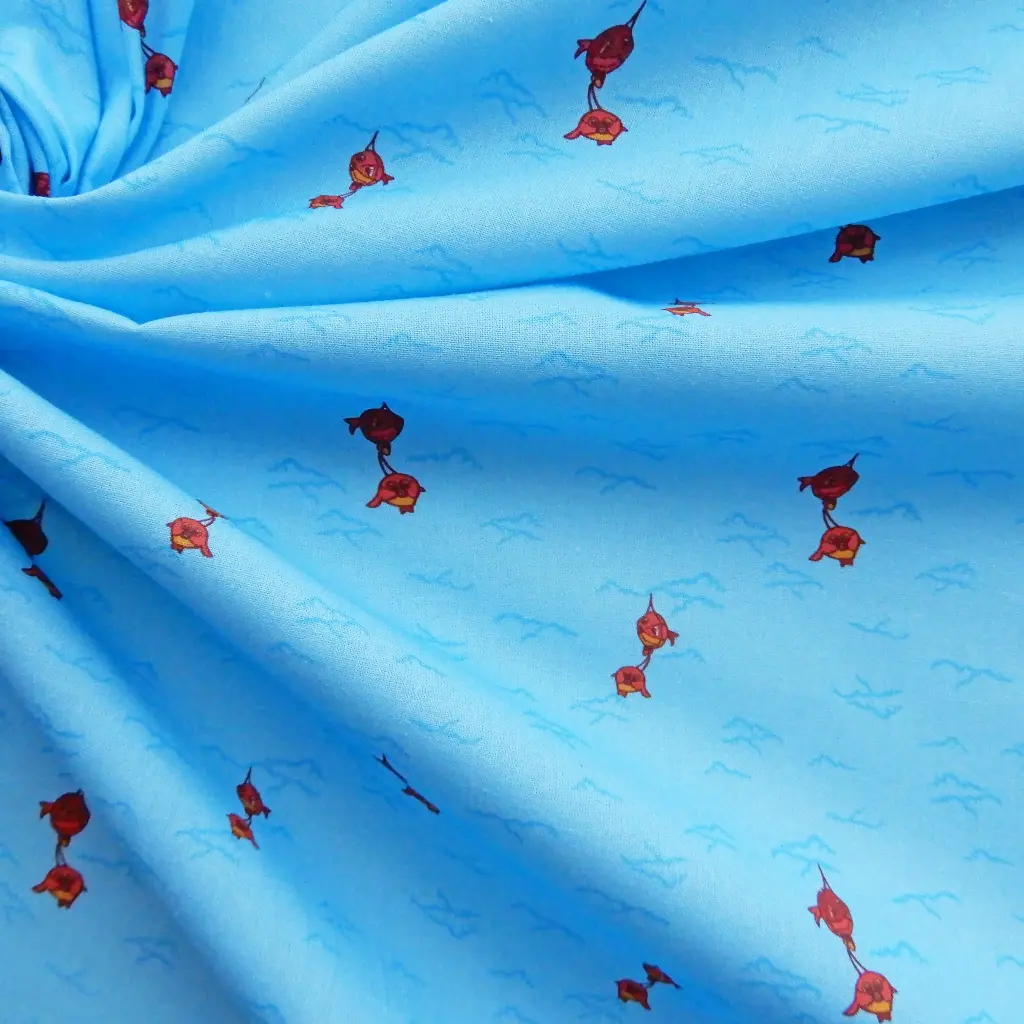Popeline de coton Petits poissons sur fond bleu ciel