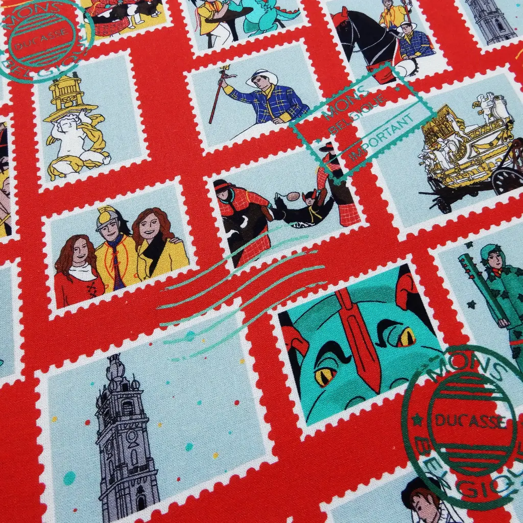 Popeline de coton Timbres du Lumeçon sur fond rouge