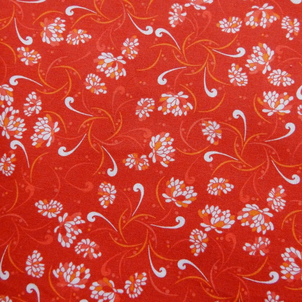 Popeline fleurie sur fond rouge